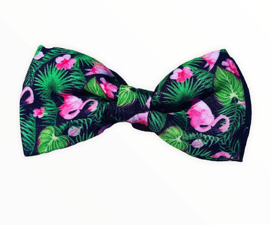 Green leafy design with pink flamingos dog bow. Stylish Puparazzi Haus pet bows.