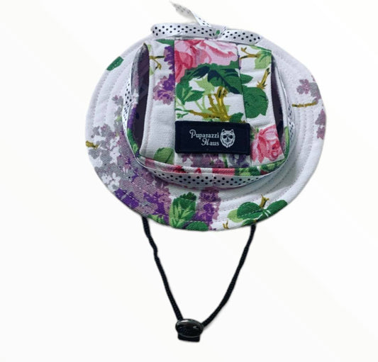 Adorable Puparazzi haus pretty flowers dog hat with draw string to keep it in place. Board brim with white ribbon with black spots design.